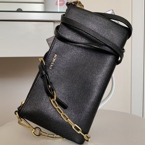 Coach genuine leather crossbody/clutch.